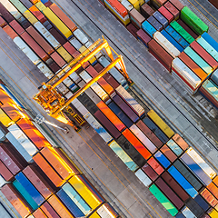 Image showing Aerial view of shipping container port terminal. Colourful pattern of containers in harbor. Maritime logistics global inport export trade transportation.