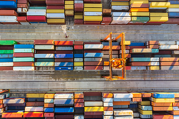 Image showing Aerial view of shipping container port terminal. Colourful pattern of containers in harbor. Maritime logistics global inport export trade transportation.