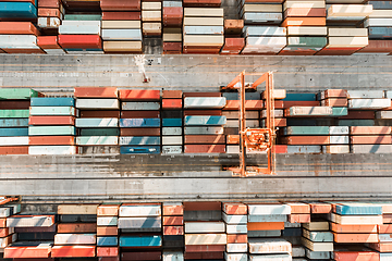 Image showing Aerial view of shipping container port terminal. Colourful pattern of containers in harbor. Maritime logistics global inport export trade transportation.