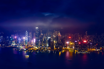 Image showing Aerial view of illuminated Hong Kong skyline. Hong Kong, China