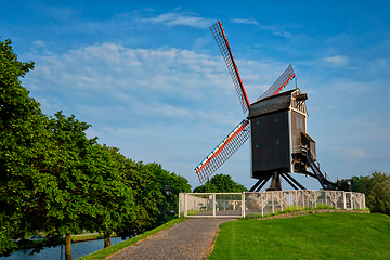 Image showing Sint-Janshuismolen Sint-Janshuis Mill windmill in Bruges on sunset, Belgium