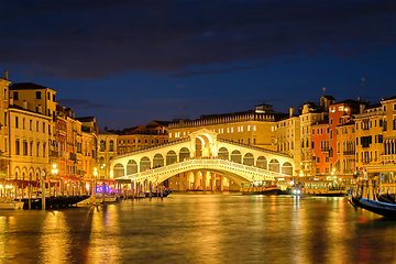 Image showing Rialto bridge Ponte di Rialto over Grand Canal at night in Venice, Italy