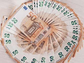 Image showing Pile of 50 euro banknotes, business concept background