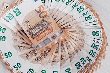 Image showing Pile of 50 euro banknotes, business concept background