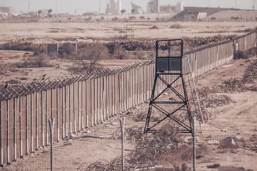 Image showing Fanced bordeline, barbed wires and watchtower. Non-passable military zone