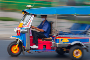 Image showing Traditional tuk-tuk from Bangkok, Thailand, in motion blur.