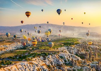 Image showing Hot air balloons at sunrise