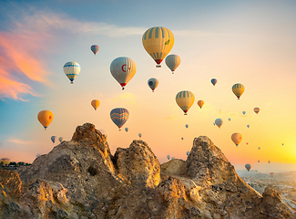 Image showing Hot air balloons over rocks