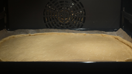 Image showing Pie in oven