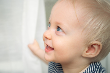 Image showing Cute baby boy with blue eyes - portrait