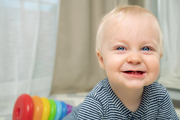 Image showing Cute baby boy with toy - portrait