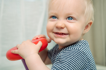 Image showing Cute baby boy with toy - portrait