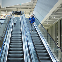 Image showing Mother and child together on escalator background. Terminal, air