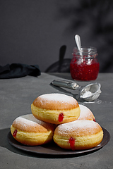 Image showing jelly donuts on grey background