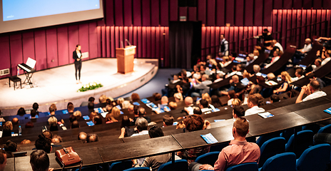 Image showing Woman giving presentation on business conference event.