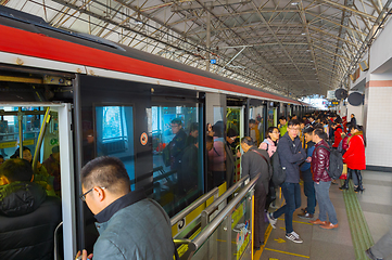 Image showing People boarding train Shanghai Metro