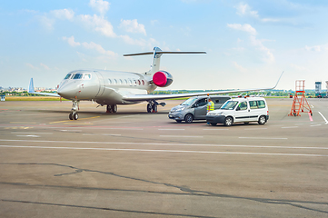 Image showing Airplane and cars at runway