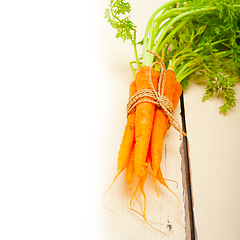 Image showing baby carrots bunch tied with rope