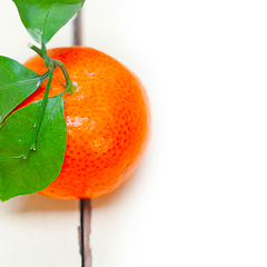Image showing tangerine mandarin orange on white table