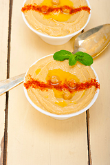 Image showing Hummus with mint on top