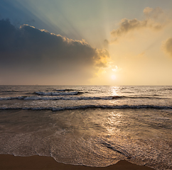 Image showing Tropical vacation background - ocean sea sunrise