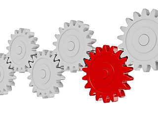 Image showing Gear cogwheels in row working together on white