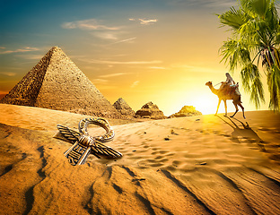 Image showing Pyramids and ankh in desert