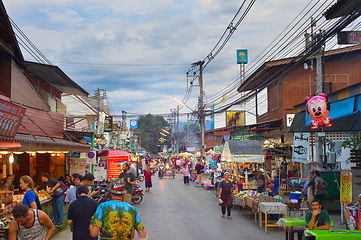 Image showing People walking street Pai Thailand