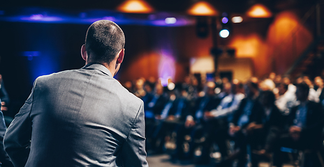 Image showing Public speaker giving talk at Business Event.