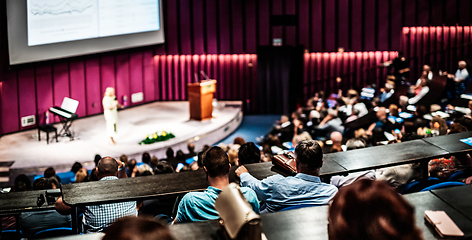 Image showing Woman giving presentation on business conference event.