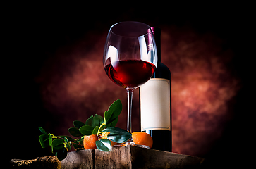 Image showing Tangerine wine in glassware