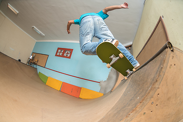 Image showing Skateboarder performing a trick