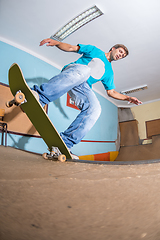 Image showing Skateboarder performing a trick