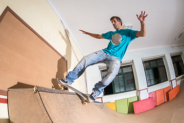 Image showing Skateboarder performing a trick