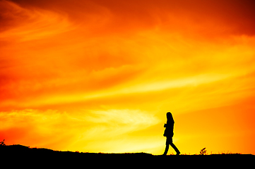 Image showing Woman walking, silhouette