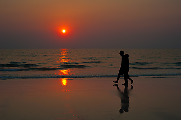 Image showing Sunset couple beach