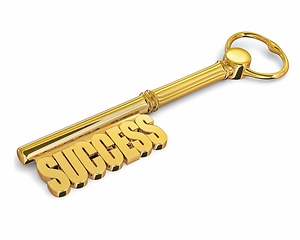 Image showing Key to success made of gold isolated