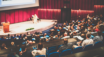 Image showing Woman giving presentation on business conference event.