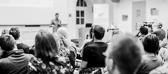 Image showing Man giving presentation in lecture hall at university.