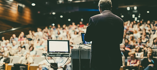 Image showing Public speaker giving talk at Business Event.