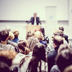 Image showing Business speaker giving a talk at business conference event.