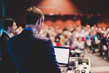 Image showing Speaker giving a talk at Business Conference and Presentation.