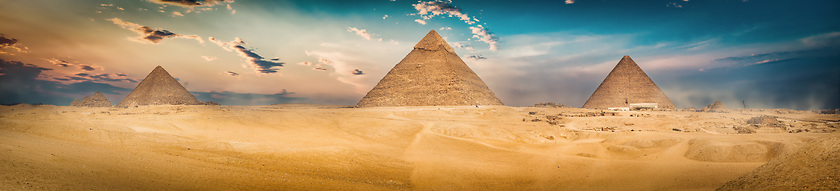 Image showing Three pyramids in the desert
