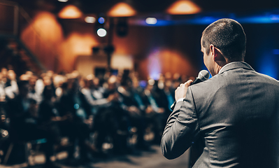 Image showing Public speaker giving talk at Business Event.