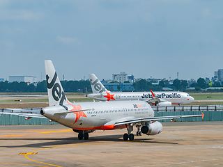 Image showing Two Jetstar Airbus A320 in Ho Chi Minh City, Vietnam