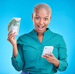 Image showing Money, phone and woman in surprise portrait, finance winning and online savings or cash prize. Success, lottery and wow of african person mobile gambling, profit or cashback on studio blue background