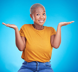 Image showing Black woman, shrug and confused portrait in studio with hand gesture, emoji or sign for doubt. African female model on a blue background for choice, decision or questions and why or unsure reaction