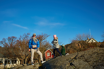 Image showing mother and little daughter travel in mountains