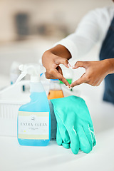 Image showing Heart hands, cleaner and chemical detergent bottle, cleaning kitchen and closeup of supplies for hygiene. Care, support and health with disinfectant spray, housekeeping and person with tools to clean