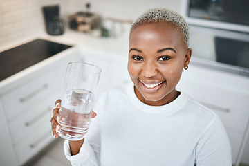 Image showing Portrait, glass or black woman drinking water, kitchen or health with nutrition, happiness or wellness. Face, female person or girl with liquid for energy, home or detox with peace, calm or apartment